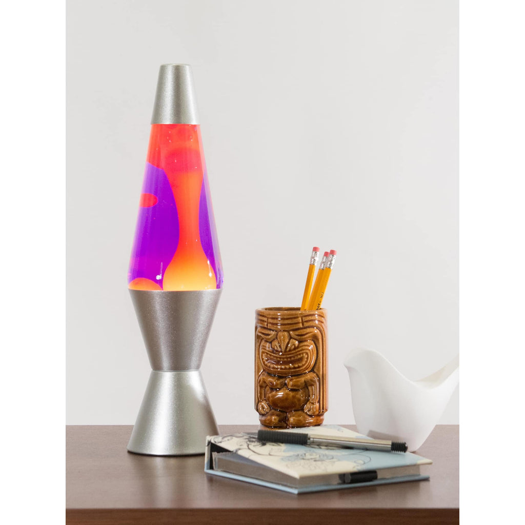 14.5" LAVA� Lamp - Yellow/Purple/Silver on a table with a notebook and tiki mug pencil cup